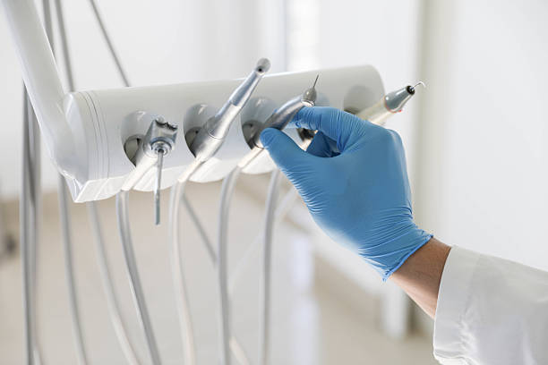 Professional Tooth Extraction technician working in Derby, KS